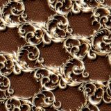Brass Steampunk Scrollwork Over Leather