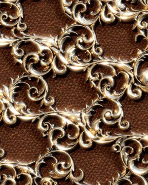 Brass Steampunk Scrollwork Over Leather